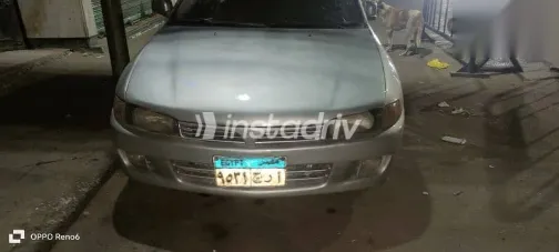 ميتسوبيشي لانسر 1998 فضي مستعملة للبيع - 1