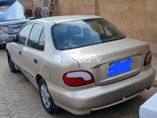 هيونداي اكسنت 2005 فضي مستعملة للبيع - 1