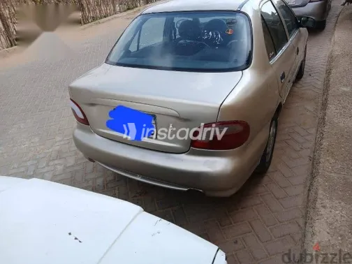 هيونداي اكسنت 2005 فضي مستعملة للبيع - 4