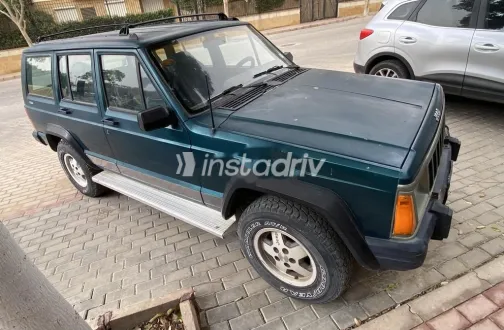 جيب شيروكي 1997 أخضر غامق مستعملة للبيع - 2