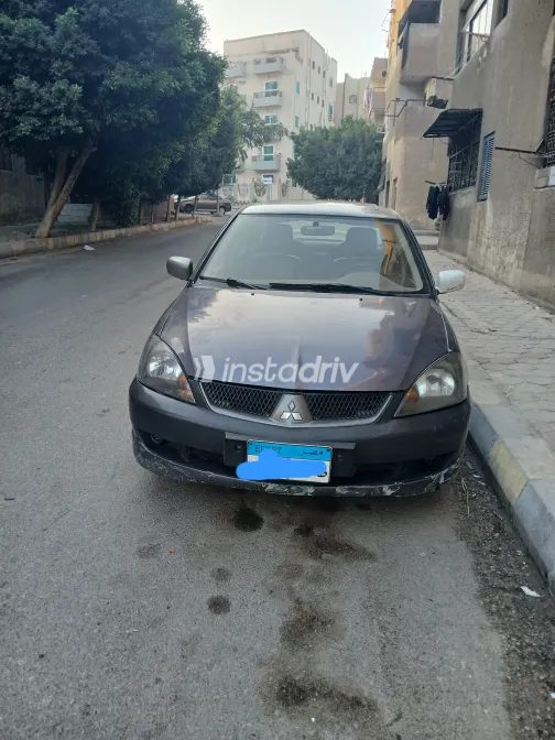 ميتسوبيشي لانسر بومة 2008 أبيض مستعملة للبيع - 2