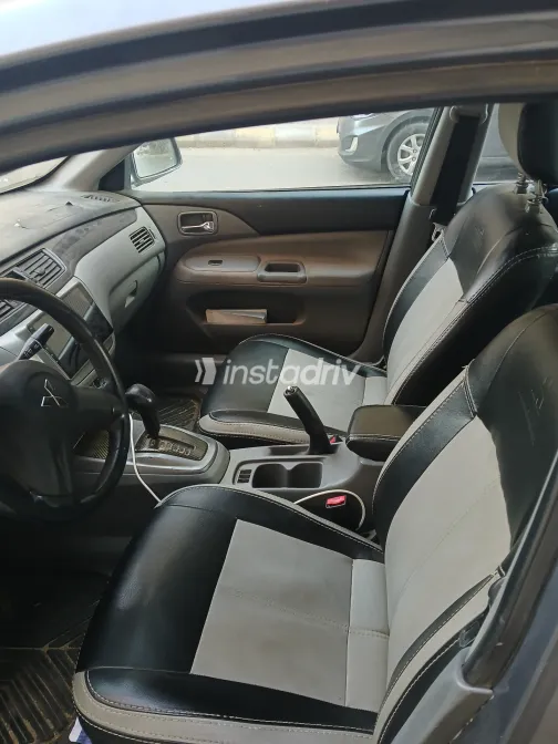 ميتسوبيشي لانسر بومة 2008 أبيض مستعملة للبيع - 4