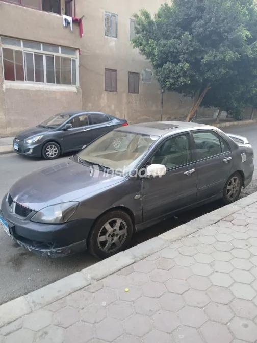 ميتسوبيشي لانسر بومة 2008 أبيض مستعملة للبيع - 6