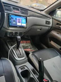 ميتسوبيشي لانسر بومة 2008 أبيض مستعملة للبيع