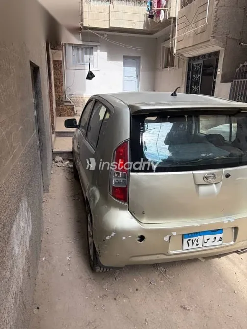 دايهاتسو سيريون 2009 ذهبي مستعملة للبيع - 2