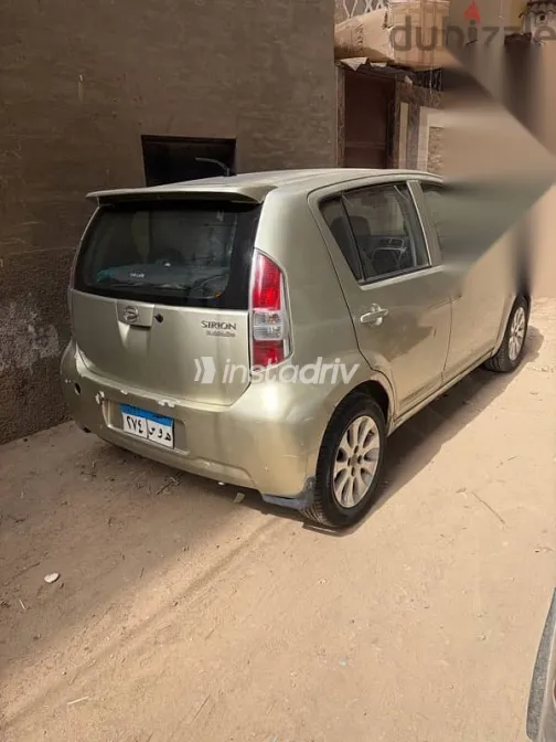 دايهاتسو سيريون 2009 ذهبي مستعملة للبيع - 3