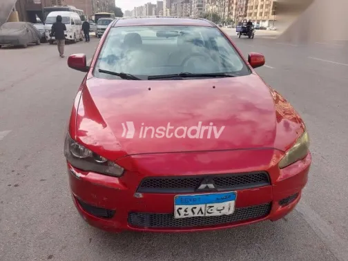 ميتسوبيشي لانسر 2014 أحمر مستعملة للبيع - 1