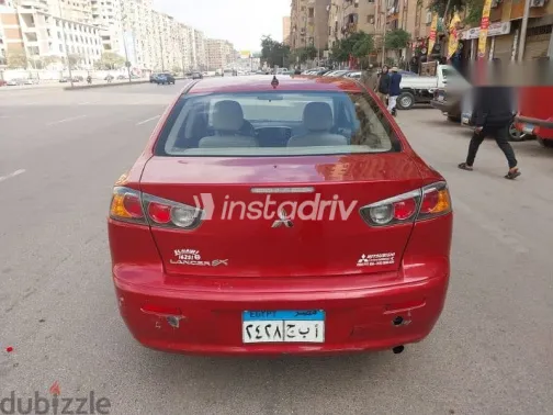 ميتسوبيشي لانسر 2014 أحمر مستعملة للبيع - 3