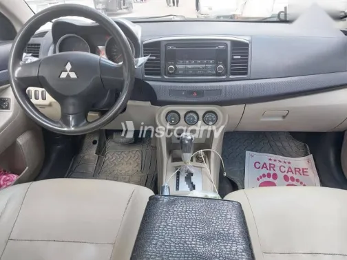 ميتسوبيشي لانسر 2014 أحمر مستعملة للبيع - 4