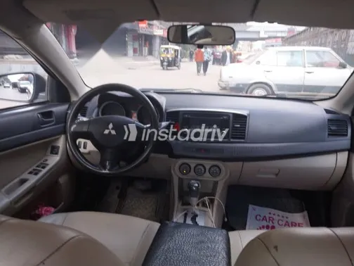 ميتسوبيشي لانسر 2014 أحمر مستعملة للبيع - 5