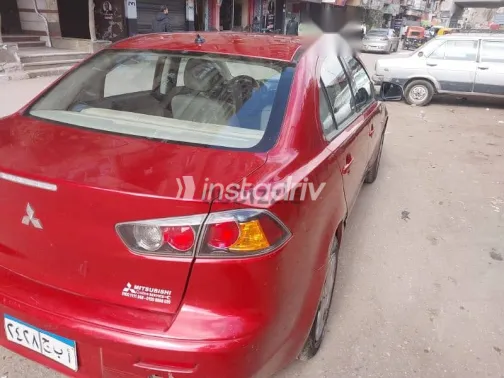 ميتسوبيشي لانسر 2014 أحمر مستعملة للبيع - 8