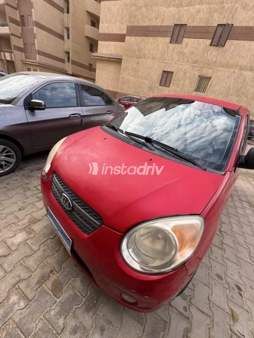 كيا بيكانتو 2009 أحمر مستعملة للبيع - 1