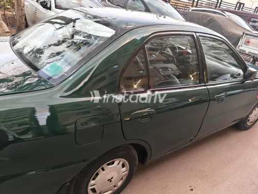 ميتسوبيشي لانسر كرستالة 2000 أخضر غامق مستعملة للبيع - 2