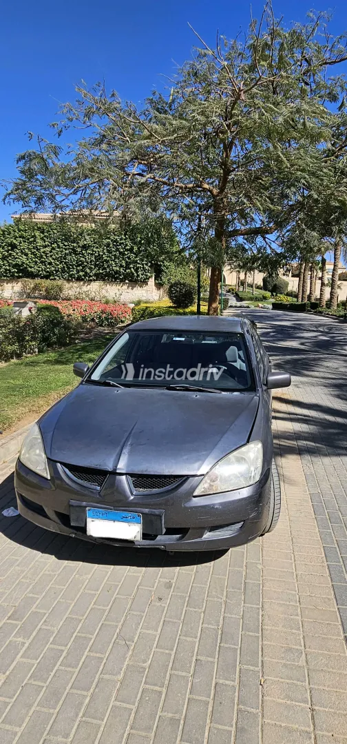 ميتسوبيشي لانسر 2006 أبيض مستعملة للبيع - 2