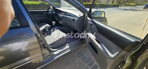 ميتسوبيشي لانسر 2006 أبيض مستعملة للبيع - 4