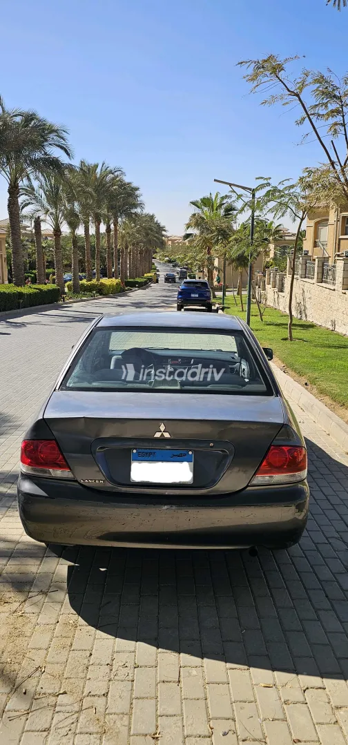 ميتسوبيشي لانسر 2006 أبيض مستعملة للبيع - 6