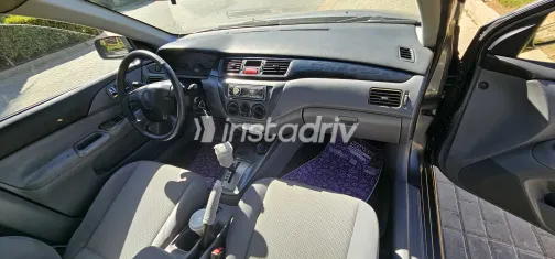 ميتسوبيشي لانسر 2006 أبيض مستعملة للبيع - 10