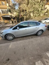 اوبل أسترا 2013 أبيض مستعملة للبيع