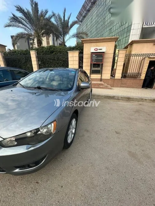 ميتسوبيشي لانسر 2015 فضي مستعملة للبيع - 3