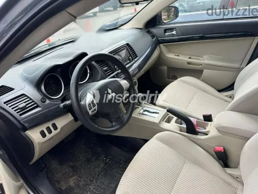 ميتسوبيشي لانسر 2015 فضي مستعملة للبيع - 6