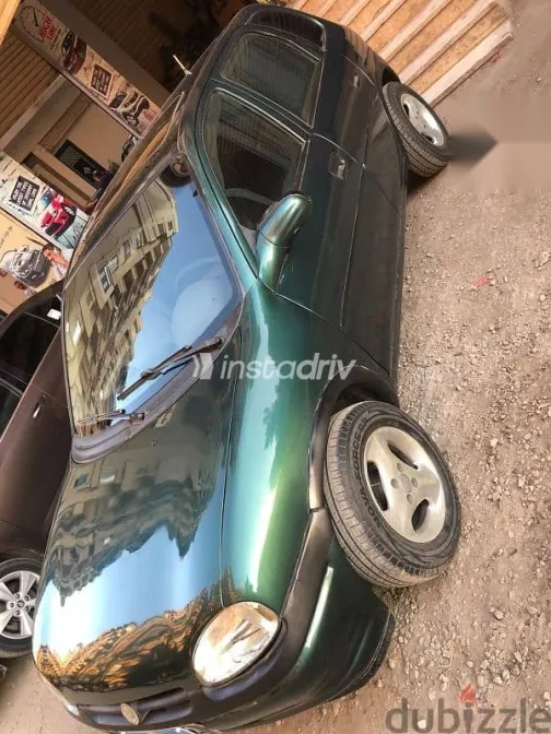 اوبل كورسا 1994 أخضر مستعملة للبيع - 1