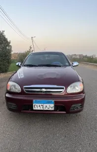 شيفروليه لانوس 2016 أحمر غامق مستعملة للبيع