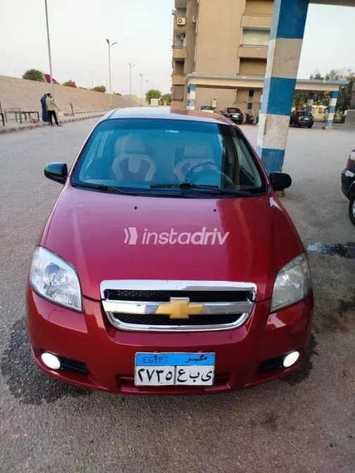 شيفروليه افيو 2009 أحمر مستعملة للبيع - 1