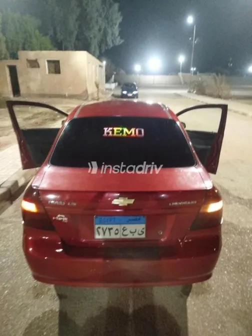 شيفروليه افيو 2009 أحمر مستعملة للبيع - 2