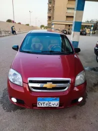 شيفروليه افيو 2009 أحمر مستعملة للبيع