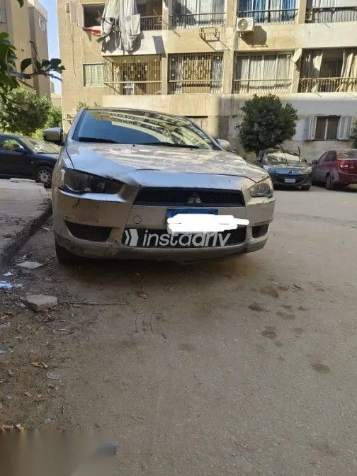 ميتسوبيشي لانسر 2016 فضي مستعملة للبيع - 1