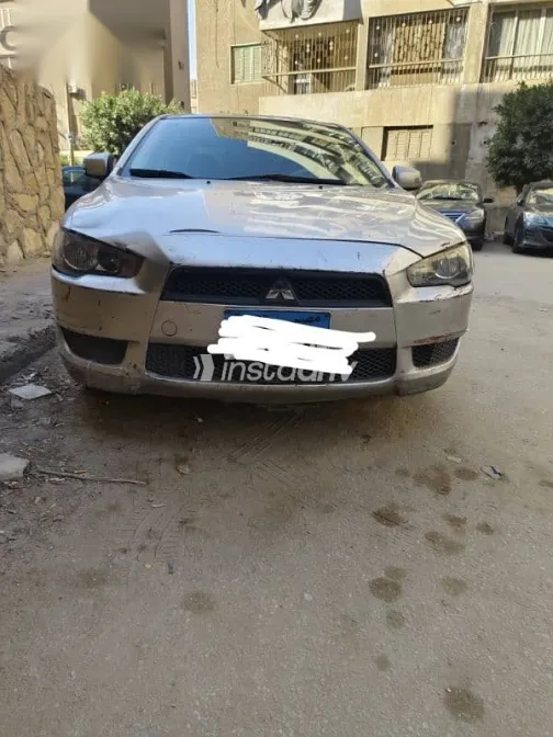 ميتسوبيشي لانسر 2016 فضي مستعملة للبيع - 2