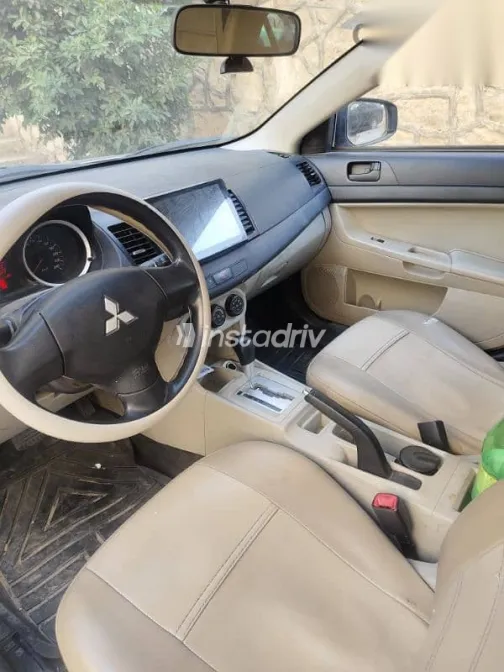 ميتسوبيشي لانسر 2016 فضي مستعملة للبيع - 6