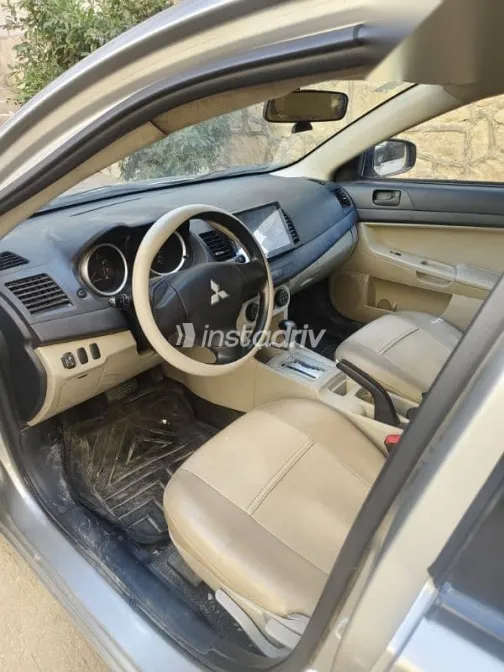 ميتسوبيشي لانسر 2016 فضي مستعملة للبيع - 7