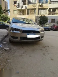 ميتسوبيشي لانسر 2016 فضي مستعملة للبيع