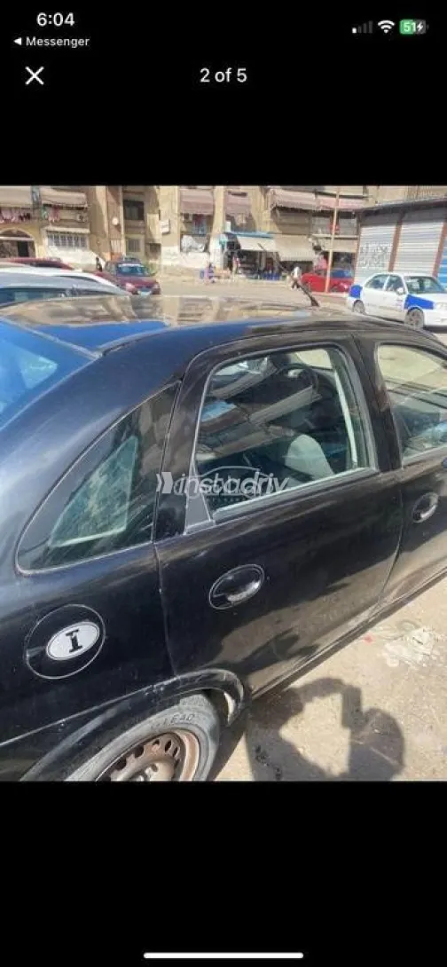 اوبل كورسا 2005 أسود مستعملة للبيع - 1