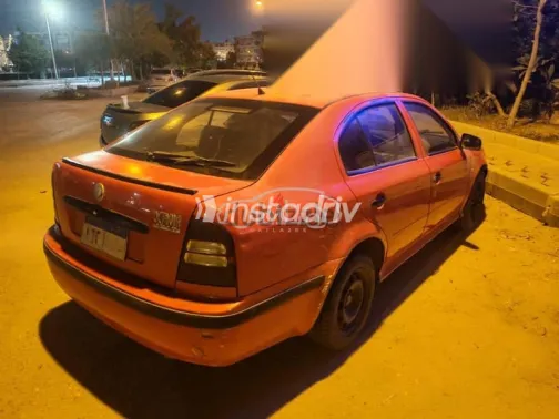 سكودا اوكتافيا 2002 أحمر مستعملة للبيع - 7