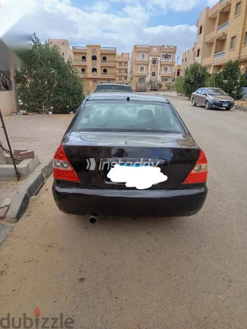 جيلي مابل 2005 أسود مستعملة للبيع - 4