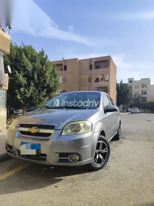 شيفروليه افيو 2012 فضي مستعملة للبيع - 1