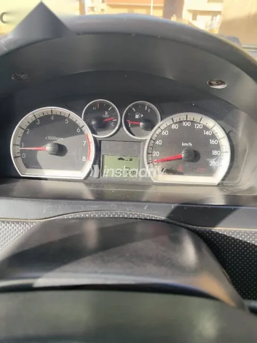 شيفروليه افيو 2012 فضي مستعملة للبيع - 4