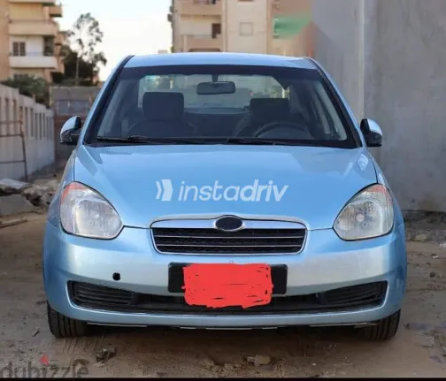 هيونداي اكسنت 2009 أزرق غامق مستعملة للبيع - 1