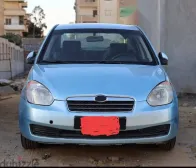 هيونداي اكسنت 2009 أزرق غامق مستعملة للبيع