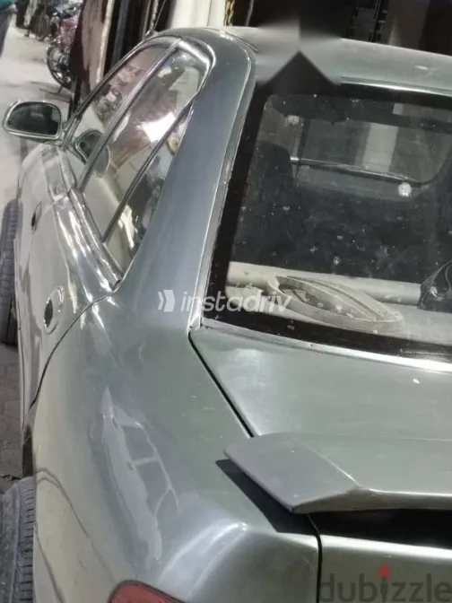 ميتسوبيشي لانسر 1993 رمادي مستعملة للبيع - 3