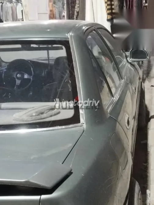 ميتسوبيشي لانسر 1993 رمادي مستعملة للبيع - 4