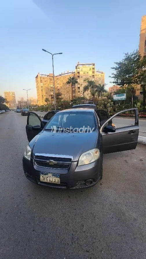 شيفروليه افيو 2013 رمادي مستعملة للبيع - 2