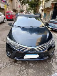 تويوتا كورولا 2014 أسود مستعملة للبيع