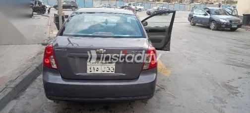 شيفروليه أوبترا 2013 بني مستعملة للبيع - 1