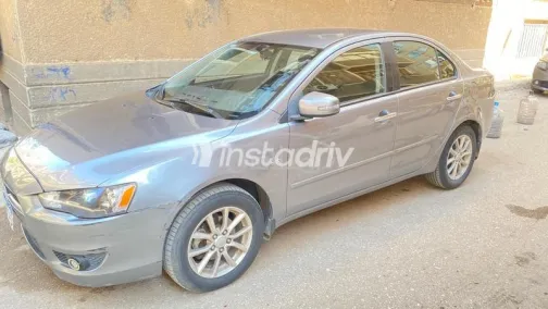 ميتسوبيشي لانسر اى اكس شارك 2016 رمادي غامق مستعملة للبيع - 1