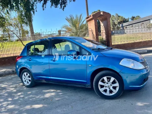 نيسان تيدا 2007 أبيض مستعملة للبيع - 8