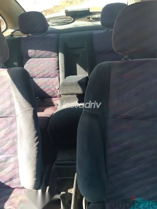 اوبل فيكترا 1996 أبيض مستعملة للبيع - 7