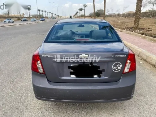 شيفروليه أوبترا 2014 رمادي مستعملة للبيع - 3